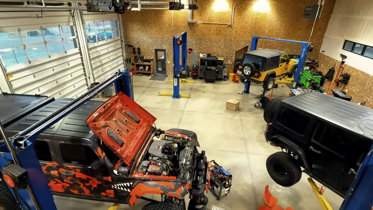 metalcloak rigs & wrenches k suspension, main shop area four vehicle lifts