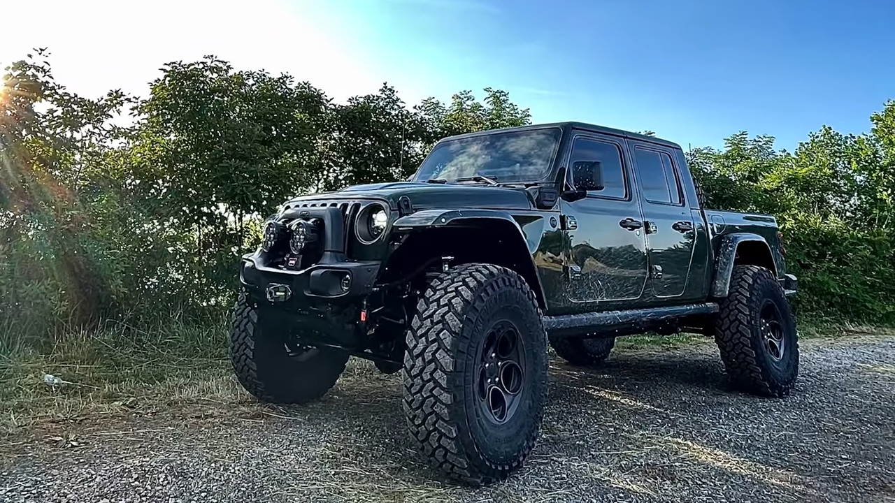 metalcloak rigs & wrenches rock your 4x4, 2022 jeep jt gladiator diesel, 42" tires with 4.5" true dual rate springs, fox shocks upgrading to rocksport black remote reservoir shocks, wheeling camping hanging out with customers