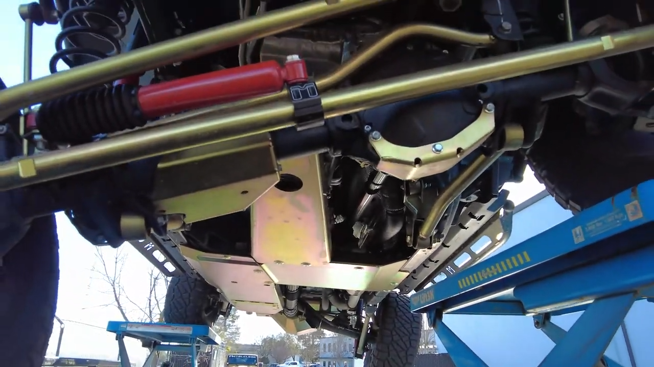 metalcloak police jeep jl wrangler, upgraded suspension components and skid plates, el dorado high auto shop body armor