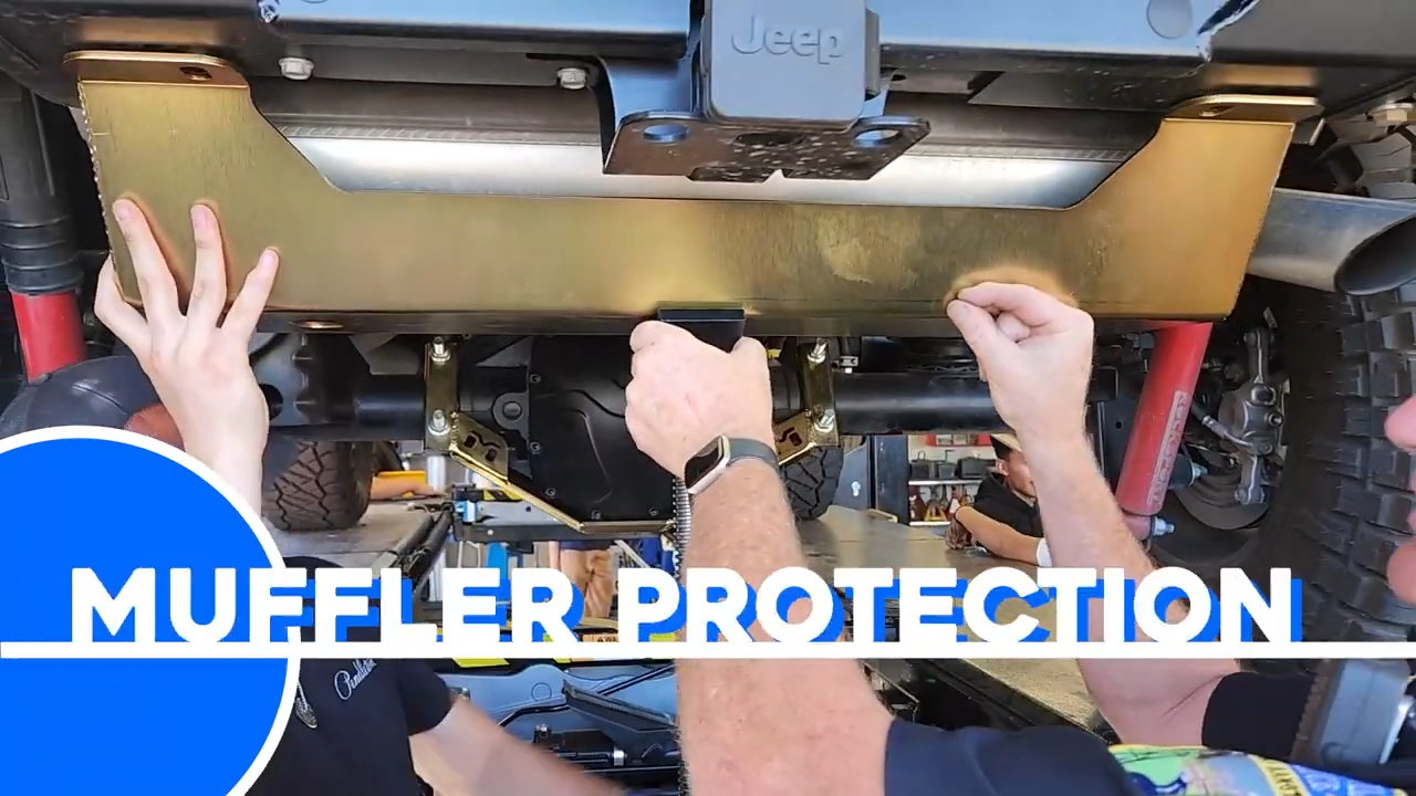 el dorado high school students install metalcloak on police jeep jl wrangler, muffler skid plate protection