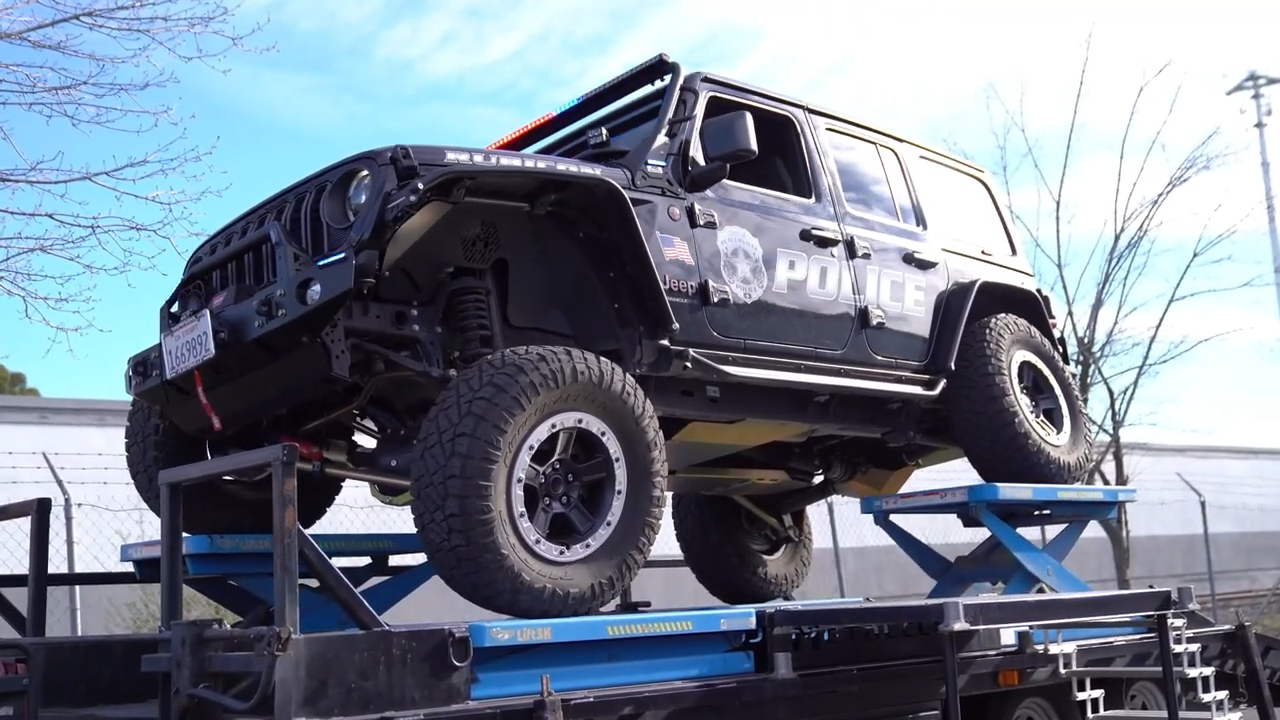 placerville police department jeep jl wrangler 2024 with MetalCloak suspension and upgrades, on CTI trailer flex test