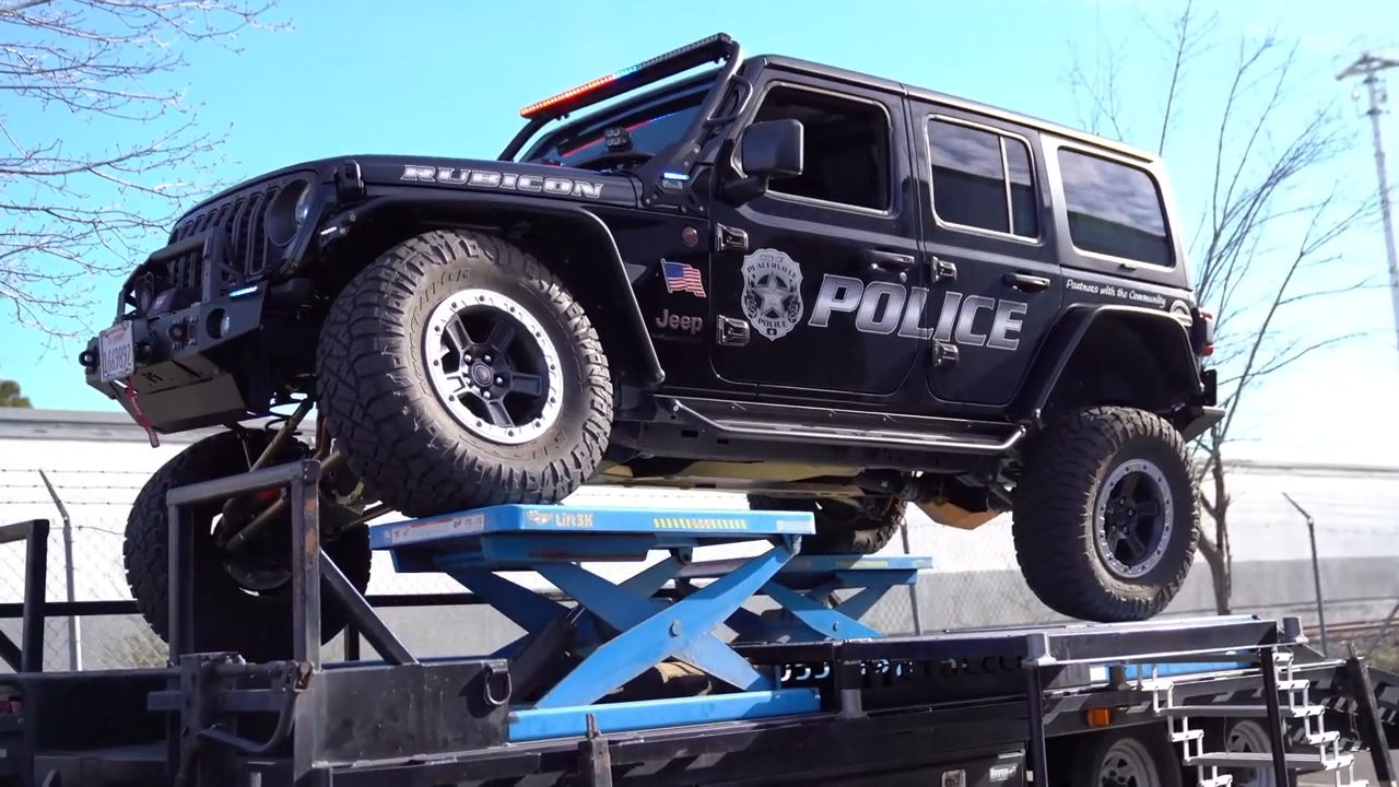 2024 police jeep jl wrangler on 35" tires, metalcloak build, comfortable and safe suspension