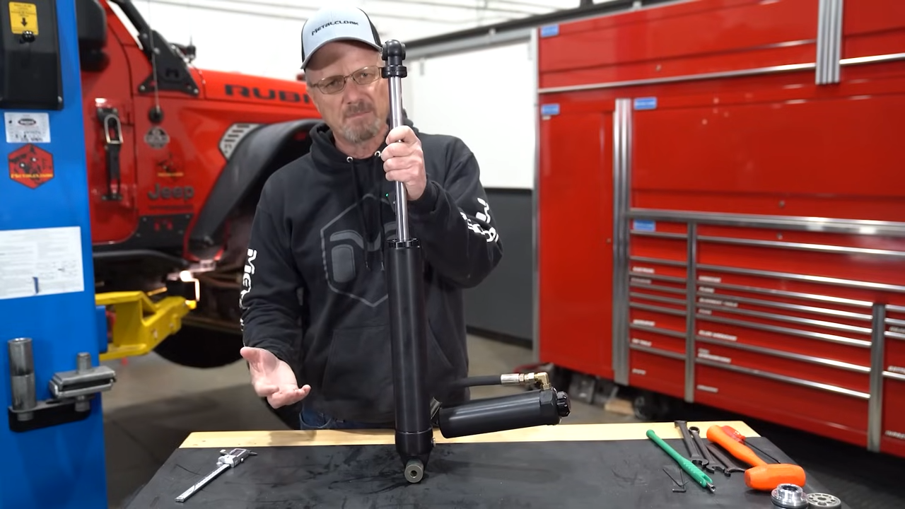 metalcloak rocksport black shock, hard anodized, more durable, prevents scratching, easy to disassemble for those who want to clean/tune their shocks
