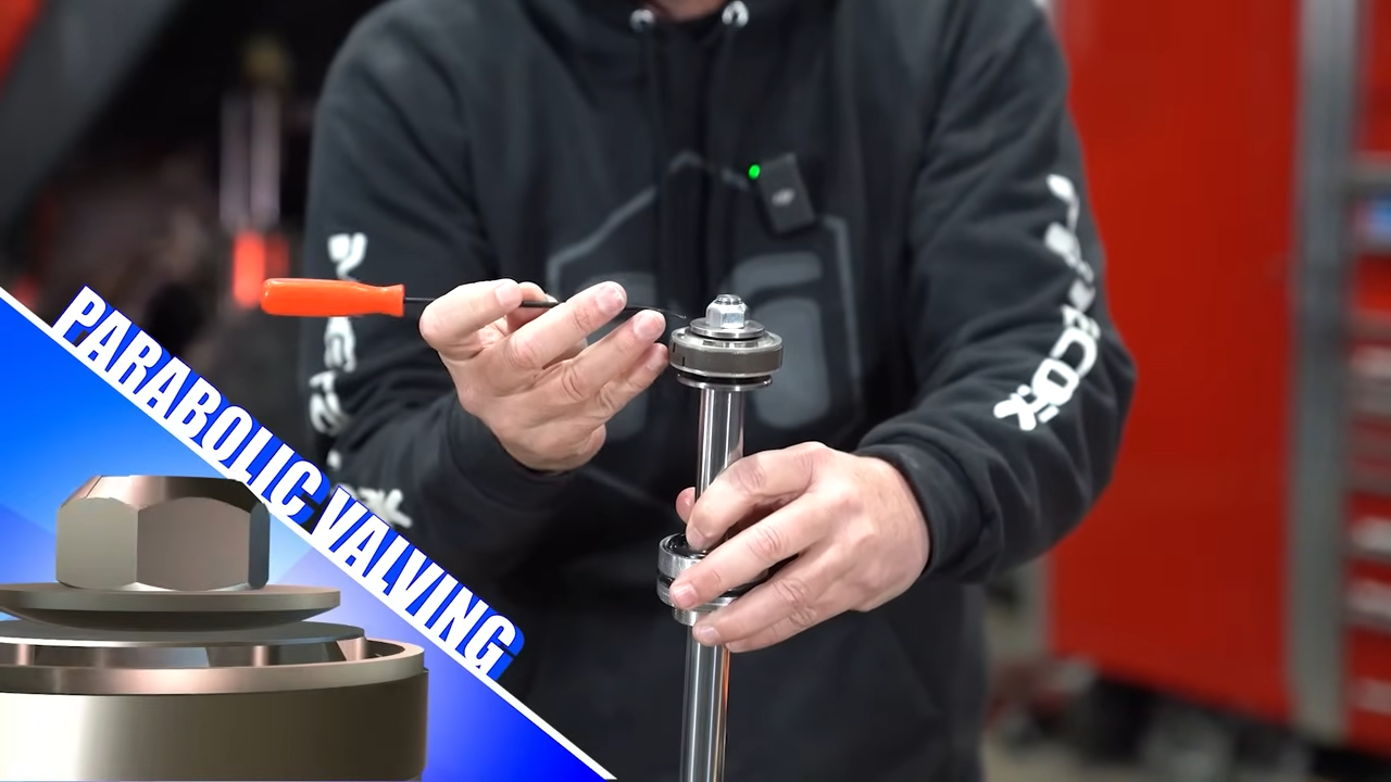 metalcloak rocksport black shock, parabolic washer, handles performance characteristics of shock, single shim controlled by parabolic shape of washer