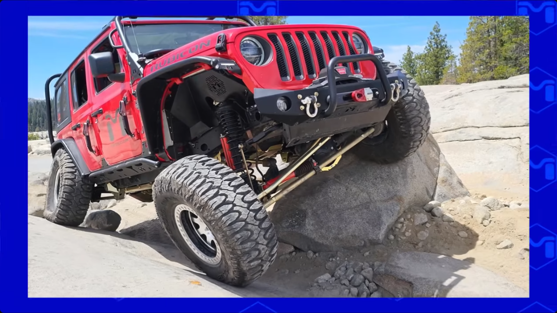 metalcloak true dual rate coils, extended coil length for additional flex, red metalcloak jeep flexed out offroad