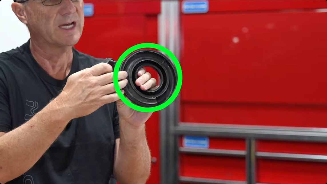 metalcloak coil spring upper isolator, added protection on the outside for more stability compared to stock upper isolator